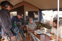 Filming Dr Eric Pianka at his Goanna research camp at Red Sands, Australia.